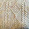 Ivory cable knit color swatch Ivory cable knit color